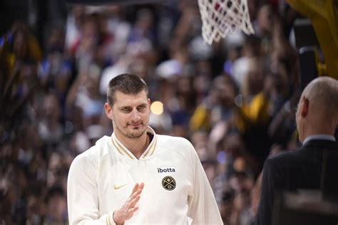 Jokic and the Nuggets receive rings, watch championship banner raised before tipping off season